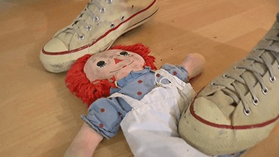 Old photos and doll destroyed by converse