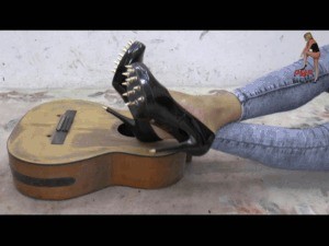 Guitar under Spiked Pumps