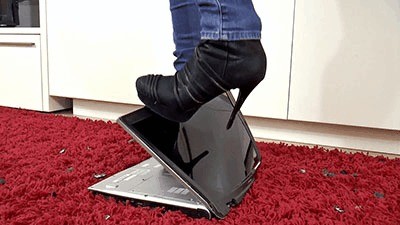Laptop completely crushed by high heels