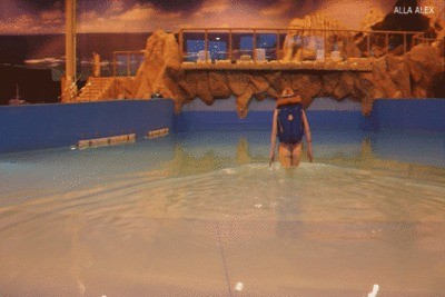 Alla is swimming alone in an inflatable vest in a big pool!!!