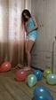 Girl Barefoot Steps On Balloons And Bursts Them