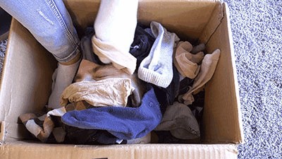 Slave buried in a box of stinky socks