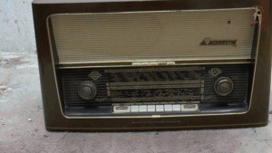 Old historical Radio under merciless Boots 4