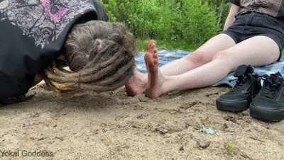 Dirty feet licking in the forest