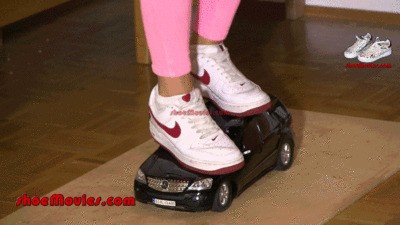 Jane crushes a Mercedes model car under her Nike Air For ce sneakers (0054)