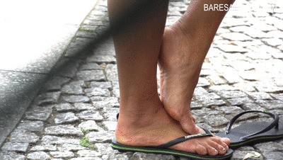 Angel face with tired looking feet in flip flops - Video update 13194