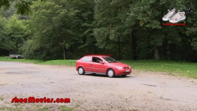 A girl walks barefoot on an Opel car (0013 partA)