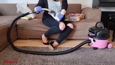 Mila vacuuming food using  3 different attachments