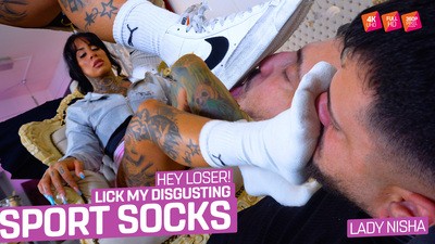 The loser on a leash has to lick my disgusting sports socks!
