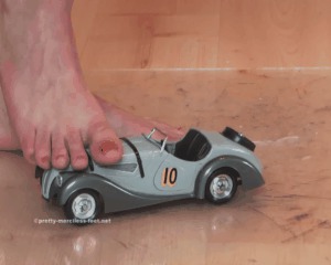 Old Car under naked Feet