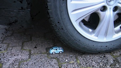 0007 - Olga in real car vs. toy cars (WMV, HD, 1280x720 Pixel)