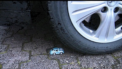 0007 - Olga in real car vs. toy cars (WMV, FULL HD, 1920x1080 Pixel)